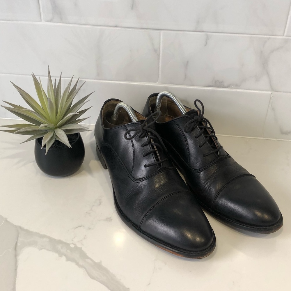 Barney’s New York Black Cap Toe Shoe.